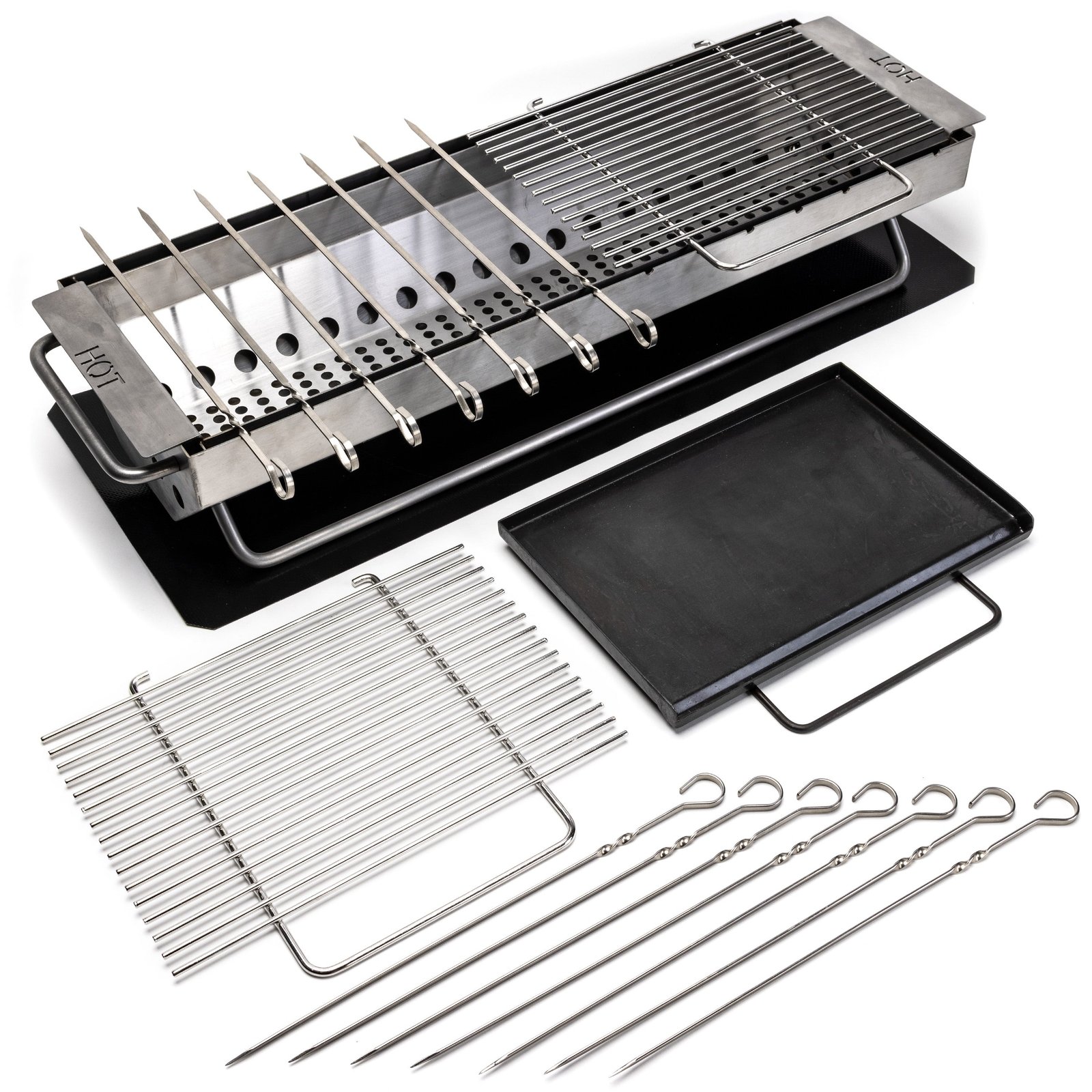 The full Hickory Summit hibachi kit disassembled on a white background: the stainless grill body, two grill grates, the raw steel flattop, twelve skewers and the storage mat, all laid out separately